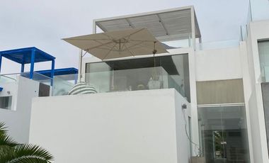 Moderna, impecable y preciosa casa de playa en en exclusivo condominio de playa (km 65Panamericana Sur).Excelente ubicación con 2 vistas, una hacia el