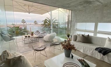 Moderna, impecable y preciosa casa de playa en en exclusivo condominio de playa (km 65Panamericana Sur).Excelente ubicación con 2 vistas, una hacia el