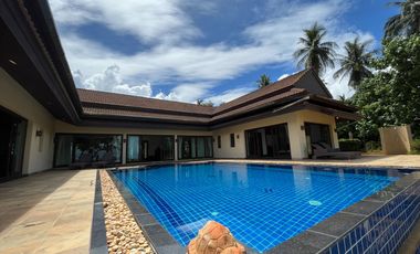 beachfront 3-bedroom Thai-Balinese style of pool villa for sale in Had yao, Krabi