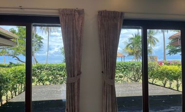 beachfront 3-bedroom Thai-Balinese style of pool villa for sale in Had yao, Krabi