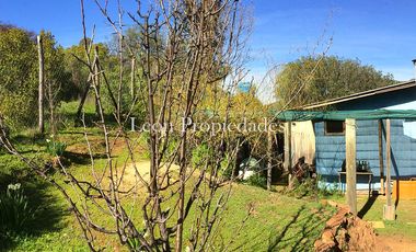 Leon Propiedades vende parcela con casa en sector las Achiras, Curacavi.