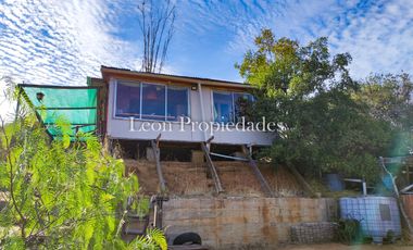 Leon Propiedades vende parcela con casa en sector las Achiras, Curacavi.