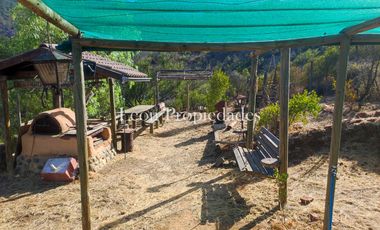 Leon Propiedades vende parcela con casa en sector las Achiras, Curacavi.