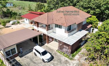 2-story detached house for sale with 20 rental rooms, area 1-2-62 rai, near CP Industrial Estate and Charlotte Village, Nikhom Phatthana, Rayong.