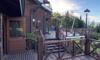 Parcela con casa en venta con orilla del Lago Villarrica