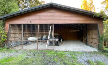 Parcela con casa en venta con orilla del Lago Villarrica