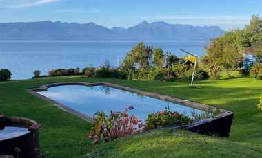 Parcela con casa en venta con orilla del Lago Villarrica