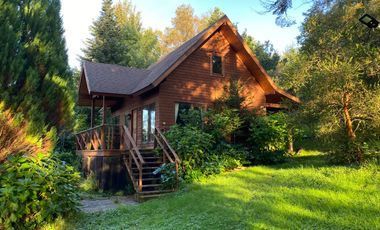 Parcela con casa en venta con orilla del Lago Villarrica